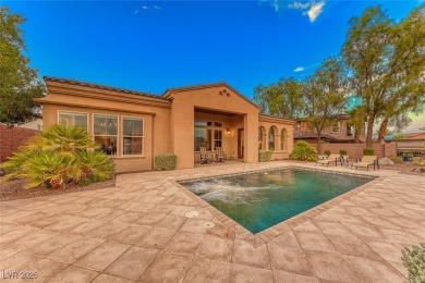 This beautiful single-story home is perched at the summit of the on  in Nevada - for sale on GolfHomes.com, golf home, golf lot