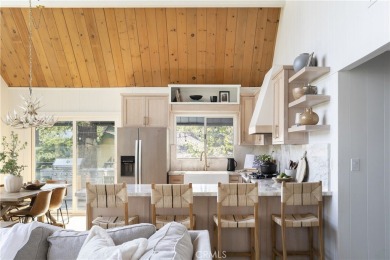 Perched in a prime first tier location, this fully renovated on Lake Arrowhead Country Club in California - for sale on GolfHomes.com, golf home, golf lot
