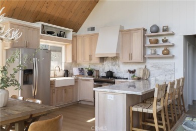 Perched in a prime first tier location, this fully renovated on Lake Arrowhead Country Club in California - for sale on GolfHomes.com, golf home, golf lot