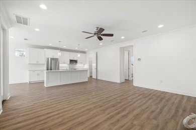 Discover refined coastal living in this beautifully upgraded on Origins Golf Club in Florida - for sale on GolfHomes.com, golf home, golf lot