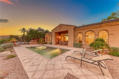 This beautiful single-story home is perched at the summit of the on  in Nevada - for sale on GolfHomes.com, golf home, golf lot