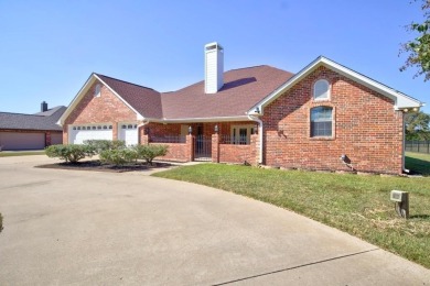 This beautiful 3-bedroom, 3-bathroom brick home in the heart of on Cedar Creek Country Club in Texas - for sale on GolfHomes.com, golf home, golf lot