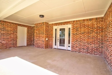 This beautiful 3-bedroom, 3-bathroom brick home in the heart of on Cedar Creek Country Club in Texas - for sale on GolfHomes.com, golf home, golf lot