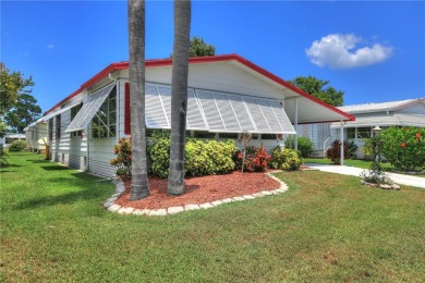 Charming and move-in ready, this home features a welcoming on Barefoot Bay Golf Course in Florida - for sale on GolfHomes.com, golf home, golf lot