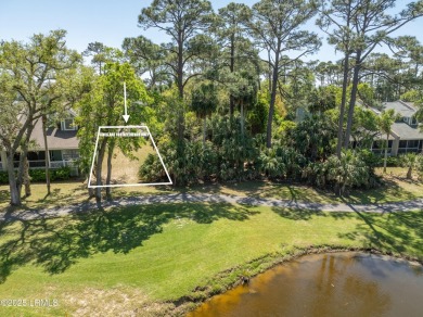 This beautiful lot overlooking the 16th fairway on the Ocean on Ocean Creek Golf Course in South Carolina - for sale on GolfHomes.com, golf home, golf lot