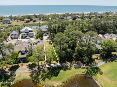 This beautiful lot overlooking the 16th fairway on the Ocean on Ocean Creek Golf Course in South Carolina - for sale on GolfHomes.com, golf home, golf lot