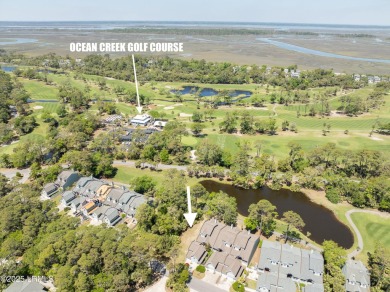 This beautiful lot overlooking the 16th fairway on the Ocean on Ocean Creek Golf Course in South Carolina - for sale on GolfHomes.com, golf home, golf lot