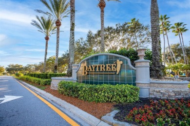 BRAND NEW TILE ROOF! Relax and Enjoy the Baytree Lifestyle in on Baytree National Golf Links in Florida - for sale on GolfHomes.com, golf home, golf lot