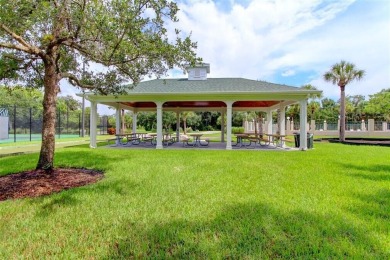 BRAND NEW TILE ROOF! Relax and Enjoy the Baytree Lifestyle in on Baytree National Golf Links in Florida - for sale on GolfHomes.com, golf home, golf lot