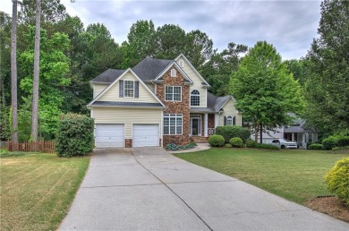 Welcome to your dream home nestled on a serene cul-de-sac within on Creekside Golf and Country Club in Georgia - for sale on GolfHomes.com, golf home, golf lot