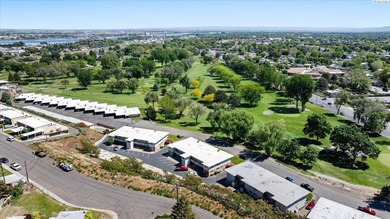 MLS# 290186 Nicely remodeled co-op a short walk away from Zintel on Tri-City Country Club in Washington - for sale on GolfHomes.com, golf home, golf lot