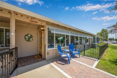 Nestled behind mature trees, this charming home offers a serene on Leisure World Seal Beach Golf Course in California - for sale on GolfHomes.com, golf home, golf lot