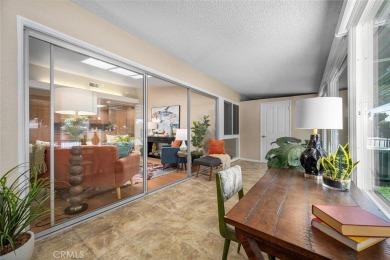 Nestled behind mature trees, this charming home offers a serene on Leisure World Seal Beach Golf Course in California - for sale on GolfHomes.com, golf home, golf lot