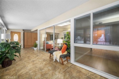 Nestled behind mature trees, this charming home offers a serene on Leisure World Seal Beach Golf Course in California - for sale on GolfHomes.com, golf home, golf lot