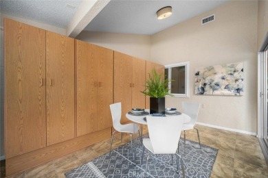 Nestled behind mature trees, this charming home offers a serene on Leisure World Seal Beach Golf Course in California - for sale on GolfHomes.com, golf home, golf lot