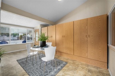 Nestled behind mature trees, this charming home offers a serene on Leisure World Seal Beach Golf Course in California - for sale on GolfHomes.com, golf home, golf lot
