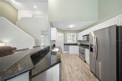 Located in gated Barclay Place, this end unit condominium offers on Heathrow Country Club in Florida - for sale on GolfHomes.com, golf home, golf lot