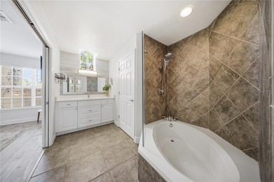 Located in gated Barclay Place, this end unit condominium offers on Heathrow Country Club in Florida - for sale on GolfHomes.com, golf home, golf lot