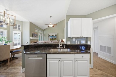 Located in gated Barclay Place, this end unit condominium offers on Heathrow Country Club in Florida - for sale on GolfHomes.com, golf home, golf lot