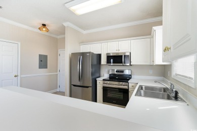 MOTIVATED SELLER! Must see this 2-bedroom/2-bathroom top floor on World Tour Golf Links in South Carolina - for sale on GolfHomes.com, golf home, golf lot