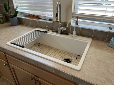 Beautifully maintained, unique, spacious open floorplan, located on Water Oak Country Club Estates in Florida - for sale on GolfHomes.com, golf home, golf lot