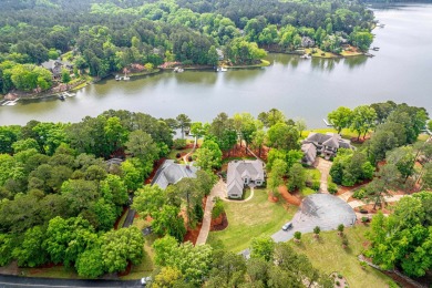 Welcome to your dream home, where timeless European charm meets on Reynolds Lake Oconee - The Landing in Georgia - for sale on GolfHomes.com, golf home, golf lot