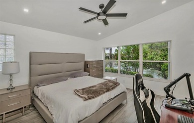 Fall in love instantly with this beautifully renovated lakefront on Grand Palms Hotel and Golf Resort in Florida - for sale on GolfHomes.com, golf home, golf lot