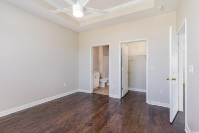 MOTIVATED SELLER! Must see this 2-bedroom/2-bathroom top floor on World Tour Golf Links in South Carolina - for sale on GolfHomes.com, golf home, golf lot
