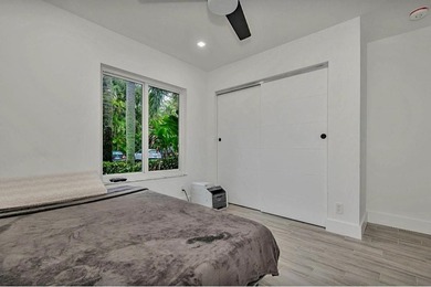 Fall in love instantly with this beautifully renovated lakefront on Grand Palms Hotel and Golf Resort in Florida - for sale on GolfHomes.com, golf home, golf lot