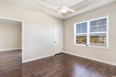 MOTIVATED SELLER! Must see this 2-bedroom/2-bathroom top floor on World Tour Golf Links in South Carolina - for sale on GolfHomes.com, golf home, golf lot