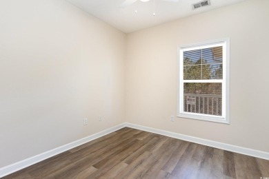 MOTIVATED SELLER! Must see this 2-bedroom/2-bathroom top floor on World Tour Golf Links in South Carolina - for sale on GolfHomes.com, golf home, golf lot