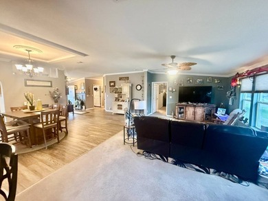 Beautifully maintained, unique, spacious open floorplan, located on Water Oak Country Club Estates in Florida - for sale on GolfHomes.com, golf home, golf lot