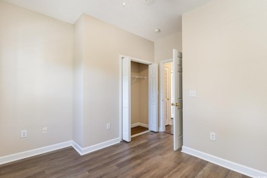 MOTIVATED SELLER! Must see this 2-bedroom/2-bathroom top floor on World Tour Golf Links in South Carolina - for sale on GolfHomes.com, golf home, golf lot