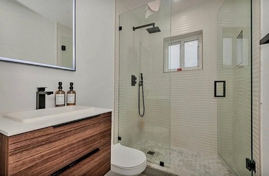 Fall in love instantly with this beautifully renovated lakefront on Grand Palms Hotel and Golf Resort in Florida - for sale on GolfHomes.com, golf home, golf lot