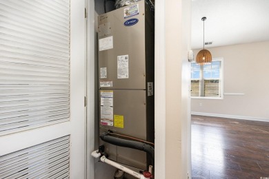 MOTIVATED SELLER! Must see this 2-bedroom/2-bathroom top floor on World Tour Golf Links in South Carolina - for sale on GolfHomes.com, golf home, golf lot