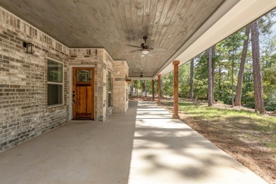 Discover your dream home just outside the city! Gorgeous new on Holly Lake Ranch Golf Club in Texas - for sale on GolfHomes.com, golf home, golf lot