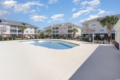 MOTIVATED SELLER! Must see this 2-bedroom/2-bathroom top floor on World Tour Golf Links in South Carolina - for sale on GolfHomes.com, golf home, golf lot