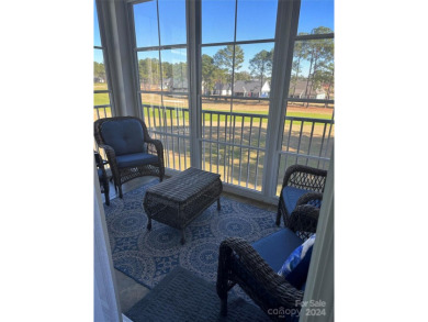 This beautifully updated third-floor condo is located in the on Sea Trail Golf Resort in North Carolina - for sale on GolfHomes.com, golf home, golf lot