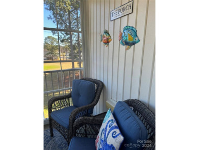 This beautifully updated third-floor condo is located in the on Sea Trail Golf Resort in North Carolina - for sale on GolfHomes.com, golf home, golf lot