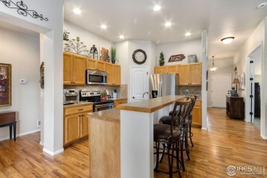 Welcome to this beautifully maintained 2-bedroom, 2-bath on Pelican Lakes Golf and Country Club in Colorado - for sale on GolfHomes.com, golf home, golf lot