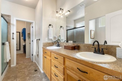 Welcome to this beautifully maintained 2-bedroom, 2-bath on Pelican Lakes Golf and Country Club in Colorado - for sale on GolfHomes.com, golf home, golf lot