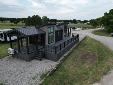 Do you love the lake? How about golf? This new cottage is on Lone Cedar Golf Course in Texas - for sale on GolfHomes.com, golf home, golf lot