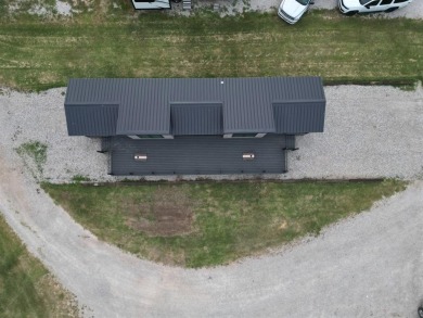 Do you love the lake? How about golf? This new cottage is on Lone Cedar Golf Course in Texas - for sale on GolfHomes.com, golf home, golf lot
