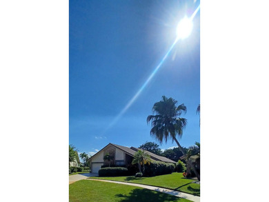 Located in a quiet cul-de-sac within a desirable golf course on Boca Greens Country Club in Florida - for sale on GolfHomes.com, golf home, golf lot