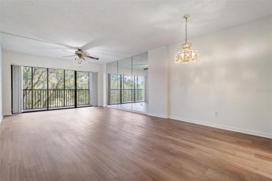 This spacious, light and bright fourth floor condo has a lovely on Cove Cay Country Club in Florida - for sale on GolfHomes.com, golf home, golf lot