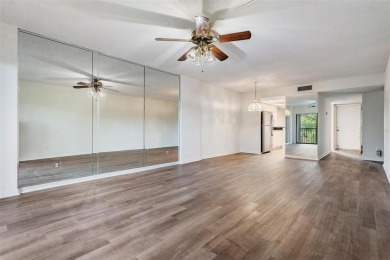 This spacious, light and bright fourth floor condo has a lovely on Cove Cay Country Club in Florida - for sale on GolfHomes.com, golf home, golf lot