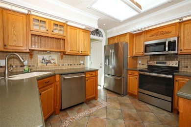Beautiful Home with huge Sparkling Screened Pool with Private on Rio Pinar Golf and Country Club in Florida - for sale on GolfHomes.com, golf home, golf lot