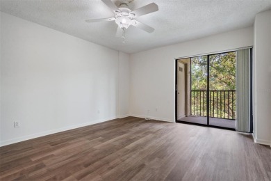 This spacious, light and bright fourth floor condo has a lovely on Cove Cay Country Club in Florida - for sale on GolfHomes.com, golf home, golf lot