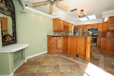 Beautiful Home with huge Sparkling Screened Pool with Private on Rio Pinar Golf and Country Club in Florida - for sale on GolfHomes.com, golf home, golf lot