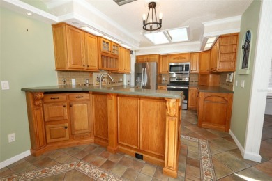 Beautiful Home with huge Sparkling Screened Pool with Private on Rio Pinar Golf and Country Club in Florida - for sale on GolfHomes.com, golf home, golf lot